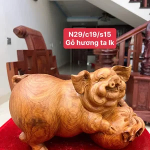 heo-nam-bao-G5825-1 Tượng Heo Nằm Bao Tiền Gỗ Hương Ta Liền Khối G5825