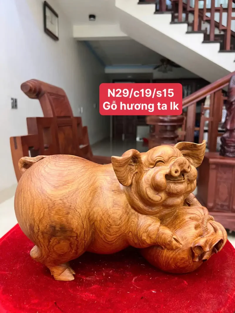 heo-nam-bao-G5825-1 Tượng Heo Nằm Bao Tiền Gỗ Hương Ta Liền Khối G5825